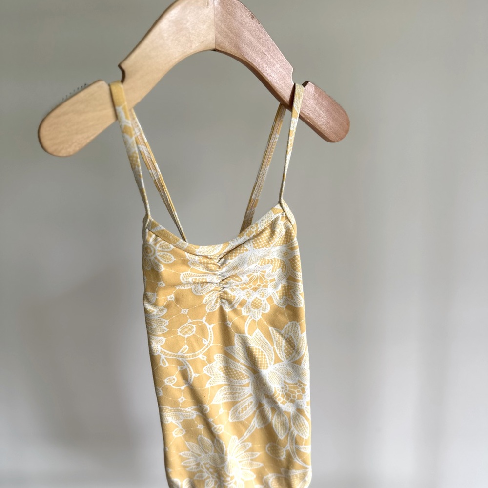 Stella Cove bathing size 4-5T yellow and white floral one piece.